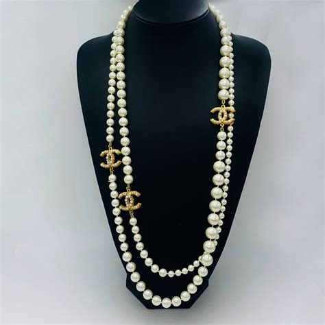 chanel classic long pearl necklace.